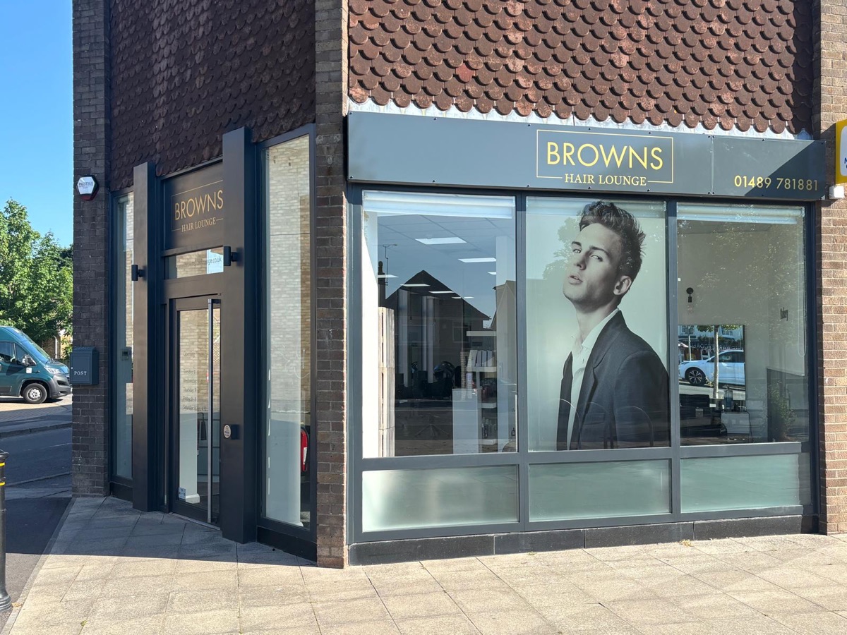 Browns Hair Lounge shop front after spraying with a fresh dark grey and gold sprayed finish